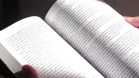 Turning pages over one at a time Video stock 106042700