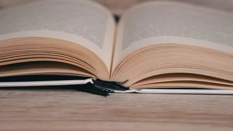 Turning Pages in a White Book Close Up Slow Mo Video stock 213380652