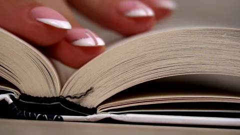 Turning Pages in a White Book Close Up Slow Mo Stock Footage 213529345