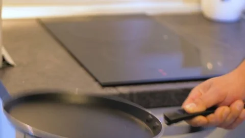 Turning A Pancake Into A Pan close up Stock Footage 75807077