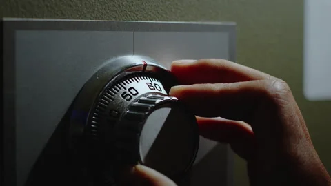 Turning a password on dial for open the safe box. Stock Footage 342525099