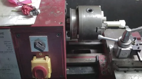 Turning of piece using mini lathe Video stock 204971189