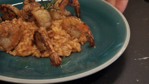 Turning plate with risotto Stock Footage 112127255