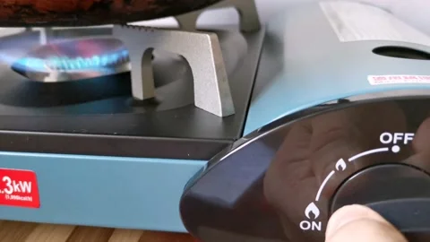 Turning on a Portable Stove Stock Footage 231118950