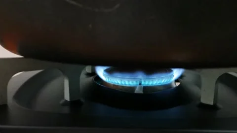Turning off a portable stove Stock Footage 234882727
