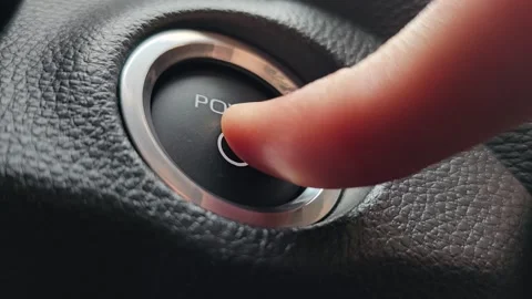 Turning On Power Button for EV or plug-in hybrid Stock Footage 276875280