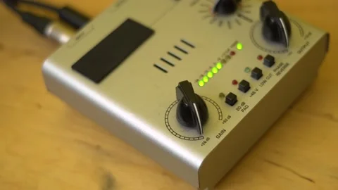 Turning on\off the preamp for musical instruments, adjusting the volume. Stock Footage 131251820