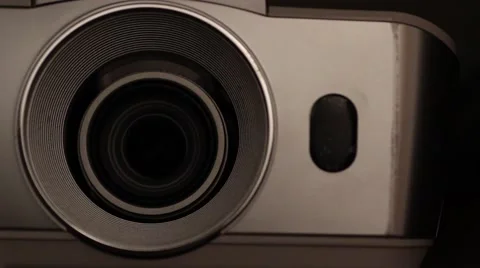 Turning on the projector, starts running Vídeo Stock 68570315