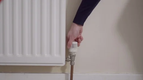 Turning up the radiator Stock Footage 86692779