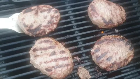 Turning Rissoles Stock Footage 245237989