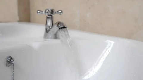 Turning off running water Stock Footage 50529393