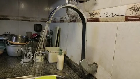 Turning off running water Stock Footage 220717356