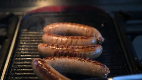Turning Sausages Stock Footage 87190276