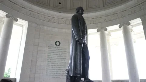 Turning shot of Thomas Jefferson inside the Jefferson Memorial on the National Stock Footage 152861155