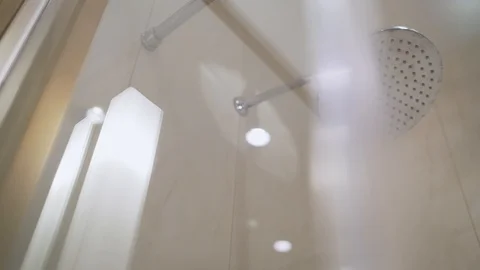 Turning on the shower. Video stock 118251403
