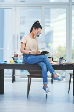 Turning simple ideas into high-end results with smart tech. a young designer Stock Photos