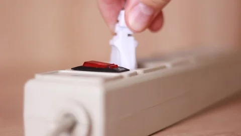 Turning socket on and inserting cable Stock Footage 86055348