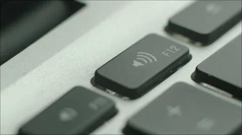 Turning Up the Sound of Laptop Using Keyboard Stock Footage 60383490