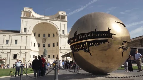 Turning Sphere Within Sphere in Vatican museum during sunny day Stock Footage 122260425