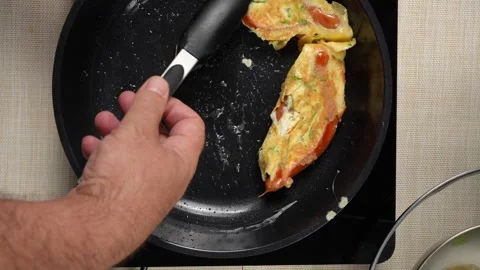 Turning Split Sausages with Cooked Egg and Green Herbs in a Pan Video stock 342804967