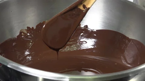 Turning spoon in the mix Stock Footage 57905882