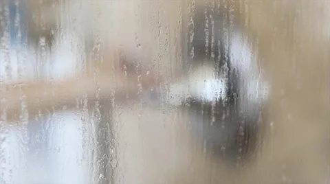 Turning up the temperature in the shower Stock Footage 46935233