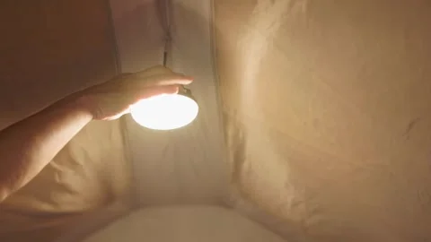 Turning On a Tent Light Stock Footage 346533804