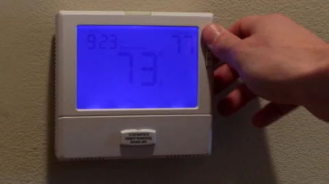 Turning Thermostat Up 動画素材 41388353