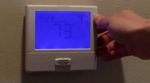 Turning Thermostat Up 動画素材 41388484