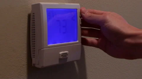 Turning Thermostat Up 動画素材 41388628