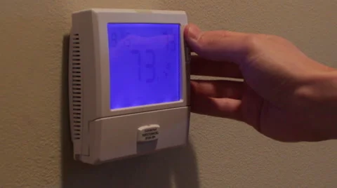 Turning Thermostat Up Stock-Footage 41388882