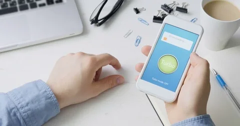 Turning on turbo mode on smartphone application for fast internet speed Stock-Footage 78514295