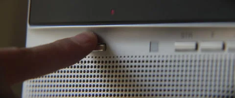 Turning off TV on button close-up 5.7K scope video Stock Footage 309683546