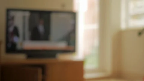 Turning off the TV Vídeo Stock 79856639