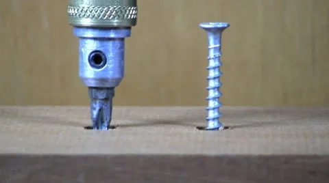 Turning two screws Stock Footage 10599916