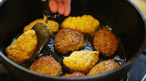 Turning vegetarian cutlets Stock Footage 40617668