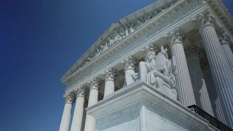 Turning view of facade of US Supreme Court building with Authority of Justice Vídeos de archivo 211682901