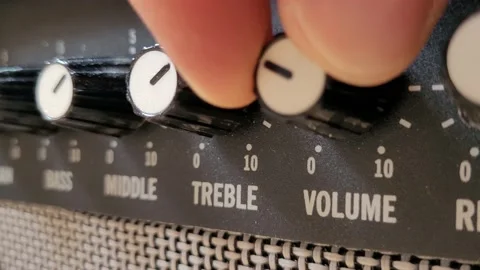 Turning up the volume. Closeup of an amplifier. Stock Footage 171035629
