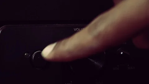 Turning on the volume Stock Footage 88395105