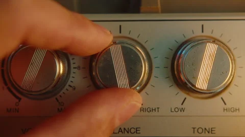 Turning Volume Knobs on Boombox 스톡 동영상 253012259