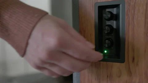 Turning up Volume on Speaker 動画素材 169063529