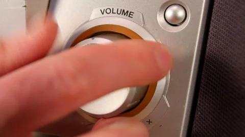 Turning up the volume on a stereo, close up Stock Footage 34482088
