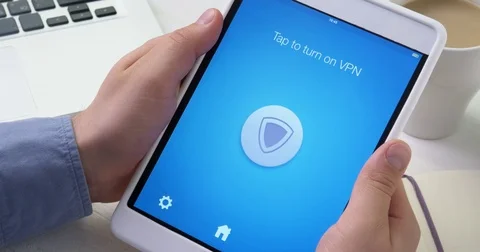 Turning on VPN on digital tablet for secure internet surfing Stock Footage 79698786