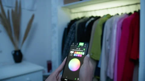 Turning On The Wardrobe's Light Stock Footage 240393694