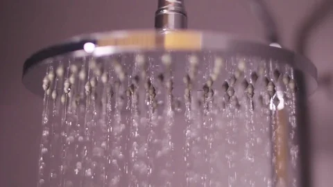 Turning off water drops falling from shower bathroom slow motion Stock Footage 84911016