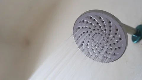 Turning off the water from shower head Stock Footage 107079855