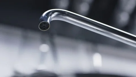 Turning on the water tap Stock Footage 71125164