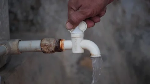 Turning on the Water tap indian village ... | Stock Video | Pond5