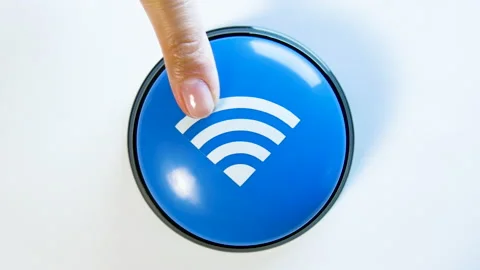 Turning on Wi-Fi by pushing blue button. Fast free network connection, internet Stock Footage 142065481