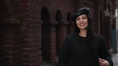 Turns around, looking at camera, relaxed lady. Stock Footage 263884815